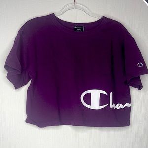 Purple Champion cropped tee.